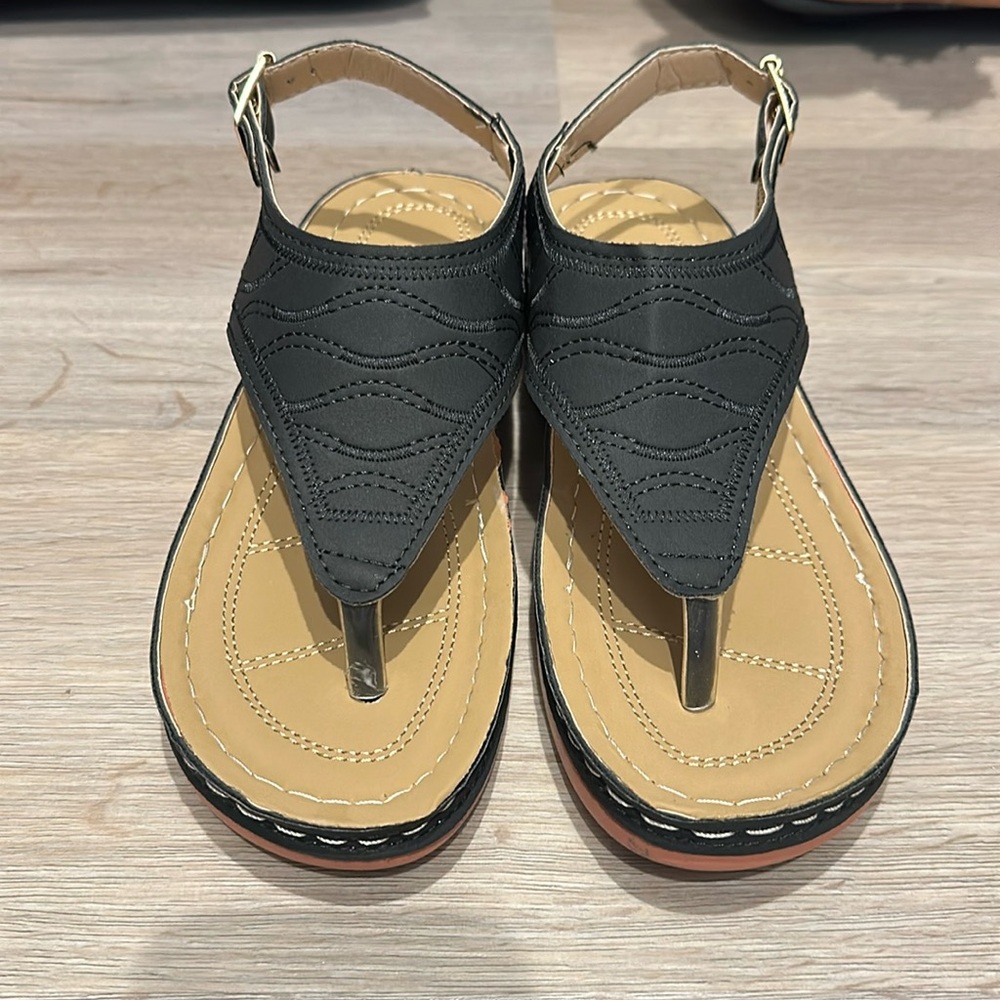 Brand new super light weight black sandals. Size 37